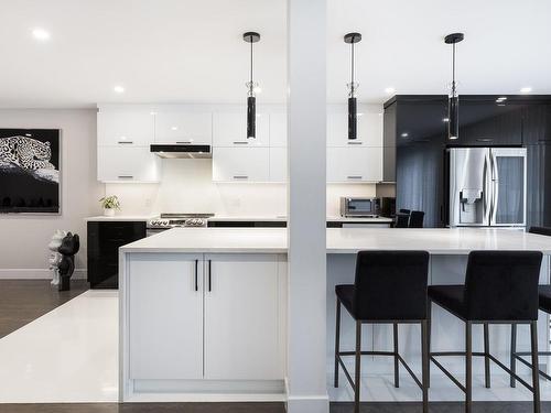 Kitchen - 4883 Rue Olivier-Maurault, Laval (Chomedey), QC - Indoor Photo Showing Kitchen With Upgraded Kitchen