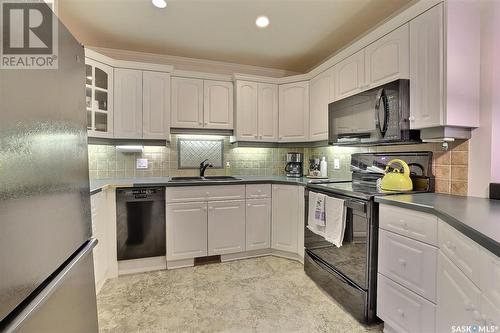 2215 Cameron Street, Regina, SK - Indoor Photo Showing Kitchen With Double Sink