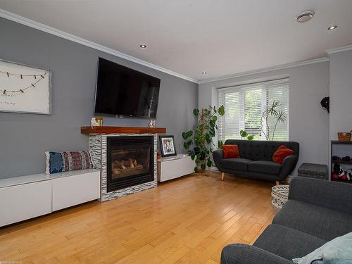 Living room - 731 Rue Samuel-De Champlain, Boucherville, QC - Indoor Photo Showing Living Room With Fireplace