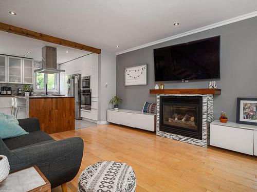 Living room - 731 Rue Samuel-De Champlain, Boucherville, QC - Indoor Photo Showing Living Room With Fireplace