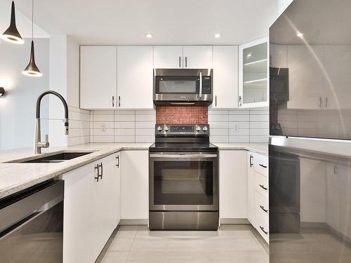 Cuisine - 1407-90 Rue Berlioz, Montréal (Verdun/Île-Des-Soeurs), QC - Indoor Photo Showing Kitchen With Double Sink With Upgraded Kitchen