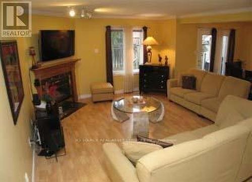 7 - 410 Ambleside Drive, London, ON - Indoor Photo Showing Living Room With Fireplace