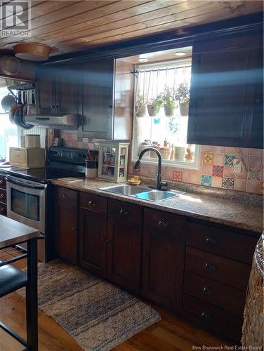 11083 Route 113, Miscou, NB - Indoor Photo Showing Kitchen With Double Sink