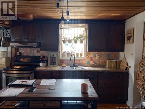 11083 Route 113, Miscou, NB - Indoor Photo Showing Kitchen With Double Sink