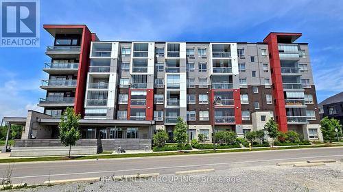 512 - 2 Adam Sellers Street, Markham, ON - Outdoor With Balcony With Facade