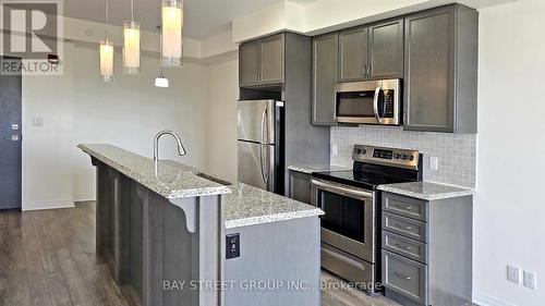 512 - 2 Adam Sellers Street, Markham, ON - Indoor Photo Showing Kitchen With Upgraded Kitchen