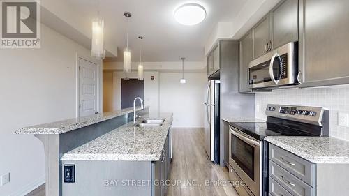 512 - 2 Adam Sellers Street, Markham, ON - Indoor Photo Showing Kitchen With Upgraded Kitchen