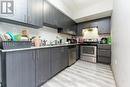 209F - 275 Larch Street, Waterloo, ON  - Indoor Photo Showing Kitchen With Stainless Steel Kitchen 