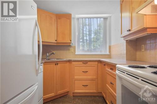 80 Sandcastle Drive Unit#408, Ottawa, ON - Indoor Photo Showing Kitchen