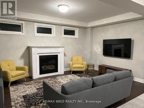 65 Port Royal Avenue, Vaughan, ON - Indoor Photo Showing Living Room With Fireplace