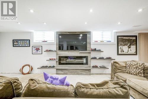 82 Burton Grove, King, ON - Indoor Photo Showing Living Room With Fireplace