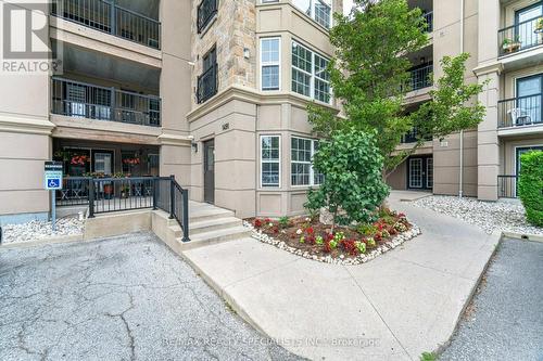 201 - 1491 Maple Avenue, Milton (Dempsey), ON - Outdoor With Balcony With Facade