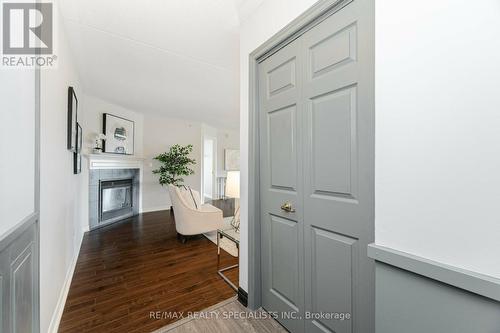 201 - 1491 Maple Avenue, Milton (Dempsey), ON - Indoor Photo Showing Other Room With Fireplace