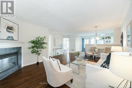 201 - 1491 Maple Avenue, Milton (Dempsey), ON - Indoor Photo Showing Living Room With Fireplace