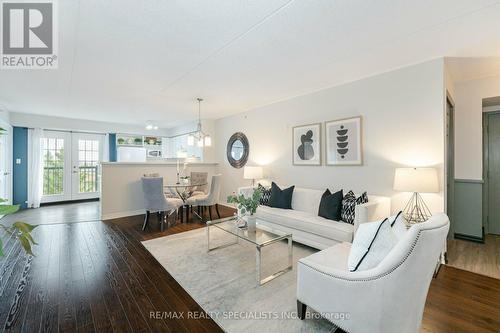 201 - 1491 Maple Avenue, Milton (Dempsey), ON - Indoor Photo Showing Living Room