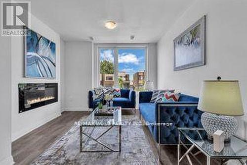 35 Stanley Greene Boulevard, Toronto (Downsview-Roding-Cfb), ON - Indoor Photo Showing Living Room With Fireplace