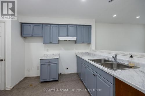 102 - 155 Glovers Road, Oshawa (Samac), ON - Indoor Photo Showing Kitchen With Double Sink