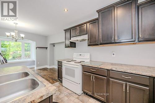 84 Glenridge Avenue, St. Catharines, ON - Indoor Photo Showing Kitchen With Double Sink