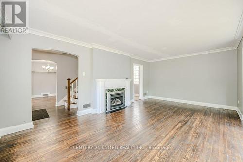 84 Glenridge Avenue, St. Catharines, ON - Indoor Photo Showing Living Room With Fireplace