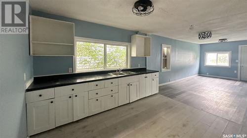 729 Elphinstone Street, Regina, SK - Indoor Photo Showing Kitchen With Double Sink