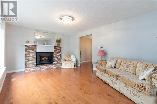 66 Birchwood Crescent, Moncton, NB - Indoor Photo Showing Living Room With Fireplace