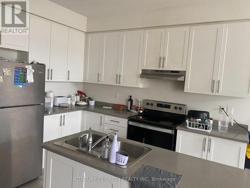 57 - 166 Deerpath Drive, Guelph (Parkwood Gardens), ON - Indoor Photo Showing Kitchen With Stainless Steel Kitchen With Double Sink