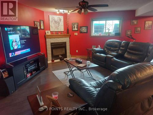 59 Stonehenge Road, London, ON - Indoor Photo Showing Living Room With Fireplace