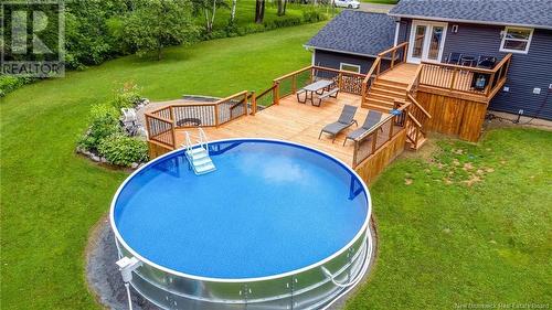 107 Camber Drive, Hanwell, NB - Outdoor With Above Ground Pool With Backyard