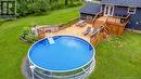 107 Camber Drive, Hanwell, NB  - Outdoor With Above Ground Pool With Backyard 