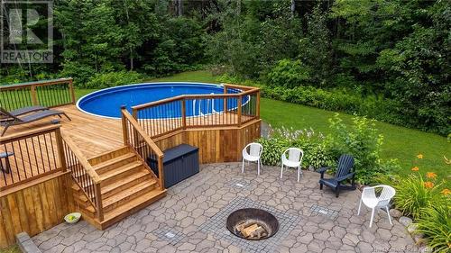 107 Camber Drive, Hanwell, NB - Outdoor With Above Ground Pool With Backyard