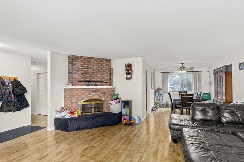 2523 Rhondda Crescent, Kelowna, BC - Indoor Photo Showing Living Room With Fireplace