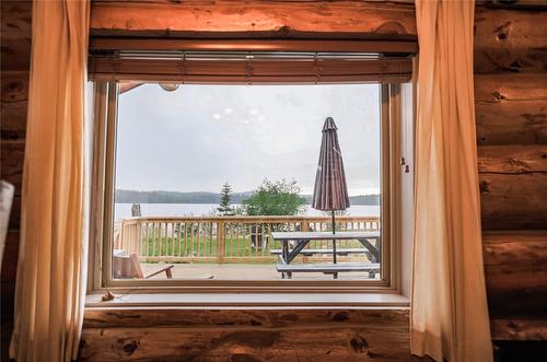 Cabin 10 Hatheume Lake Lodge, Peachland, BC - Indoor Photo Showing Other Room With Body Of Water