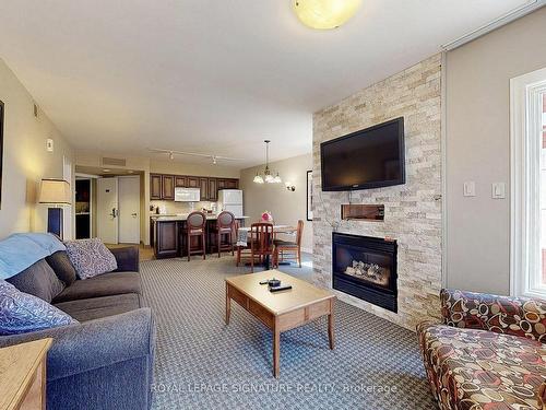 2006/20-90 Highland Dr, Oro-Medonte, ON - Indoor Photo Showing Living Room With Fireplace