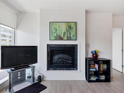 N607-707 Courtney St, Victoria, BC - Indoor Photo Showing Living Room With Fireplace