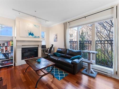 204-1642 Mckenzie Ave, Saanich, BC - Indoor Photo Showing Living Room With Fireplace