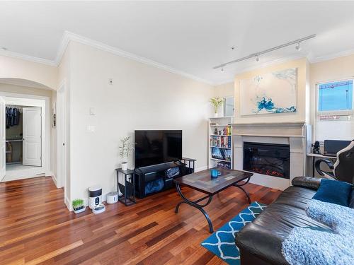 204-1642 Mckenzie Ave, Saanich, BC - Indoor Photo Showing Living Room With Fireplace