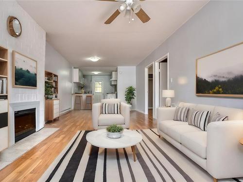 1110-1112 Beaufort Dr, Nanaimo, BC - Indoor Photo Showing Living Room With Fireplace