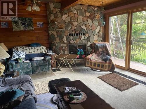 4007 Gadsby Road, Ta Ta Creek, BC - Indoor Photo Showing Living Room With Fireplace