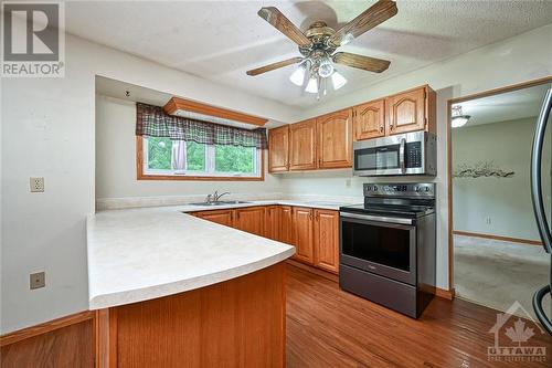 5790 Wood Duck Drive, Osgoode, ON - Indoor Photo Showing Kitchen With Double Sink