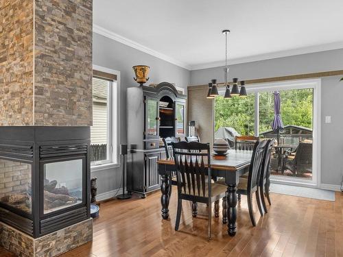 Salle Ã  manger - 2099 Rue De L'Estran, Saint-Jérôme, QC - Indoor Photo Showing Dining Room With Fireplace