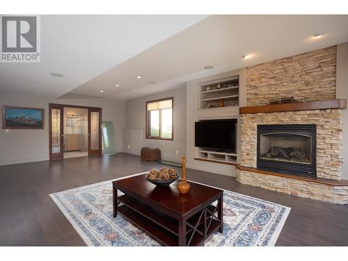 2053 Capistrano Drive, Kelowna, BC - Indoor Photo Showing Living Room With Fireplace