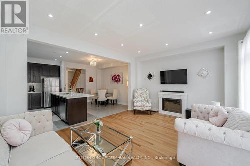 49 Walter Proctor Road, East Gwillimbury, ON - Indoor Photo Showing Living Room With Fireplace