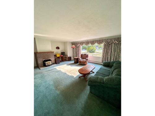 817 Fourth Street, Nelson, BC - Indoor Photo Showing Living Room With Fireplace