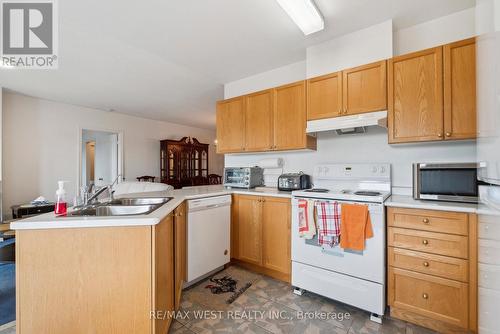 24 Todd Drive, Barrie (Innis-Shore), ON - Indoor Photo Showing Kitchen With Double Sink