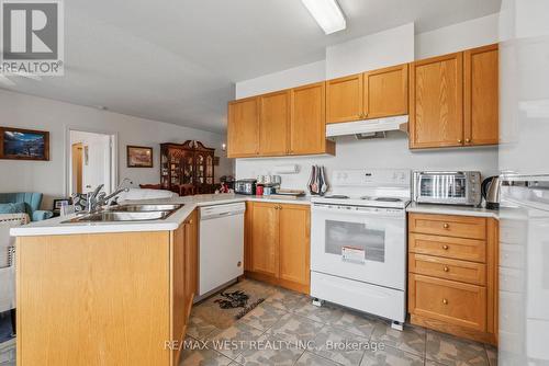 24 Todd Drive, Barrie (Innis-Shore), ON - Indoor Photo Showing Kitchen With Double Sink