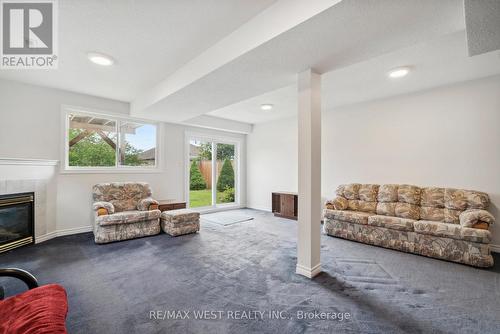 24 Todd Drive, Barrie (Innis-Shore), ON - Indoor Photo Showing Living Room With Fireplace