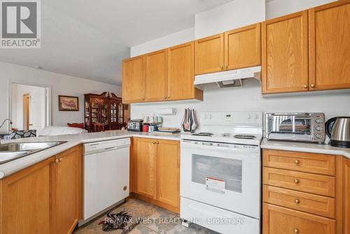 24 Todd Drive, Barrie (Innis-Shore), ON - Indoor Photo Showing Kitchen With Double Sink