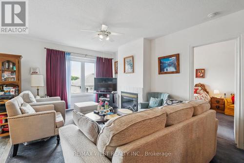 24 Todd Drive, Barrie (Innis-Shore), ON - Indoor Photo Showing Living Room With Fireplace