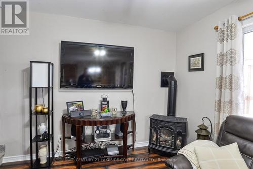 2597 Lakeshore Drive, Ramara (Brechin), ON - Indoor Photo Showing Living Room With Fireplace