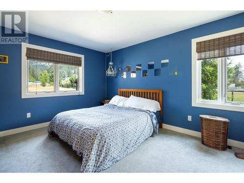 5587 Highway 6, Coldstream, BC - Indoor Photo Showing Bedroom